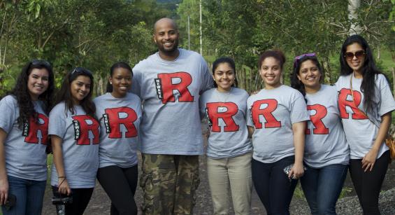 Group of students standing side by side wearing Rutgers t-shirts